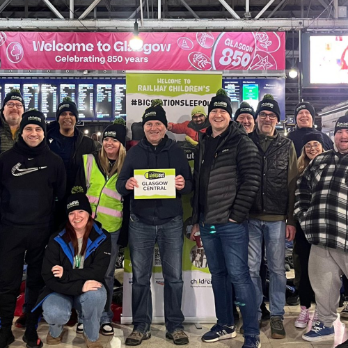 Big station sleepout, group of people gathered in a train station