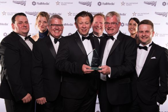 group of men collecting an award